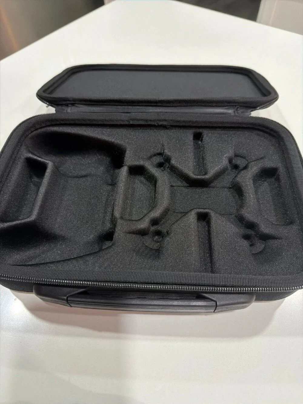 Hard-shell protective carrying case custom-molded for the DJI Ryze Tello drone